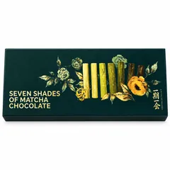 Scatola chiusa di 7 Shades of Matcha Chocolate con scritte dorate e fiori dipinti